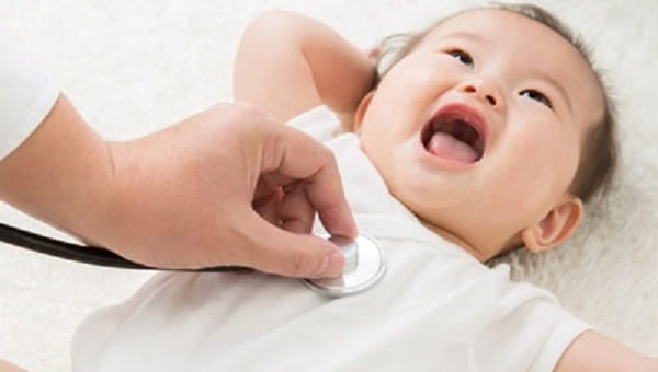 Baby and doctor