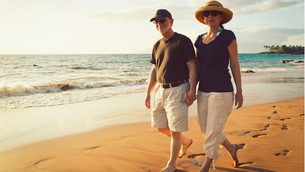 couple walking along the beach