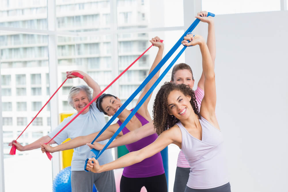 Women using resistance bands