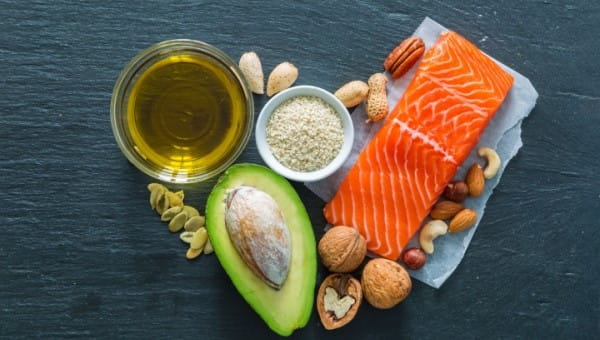 Collection of good fats like nuts, fish and avacado