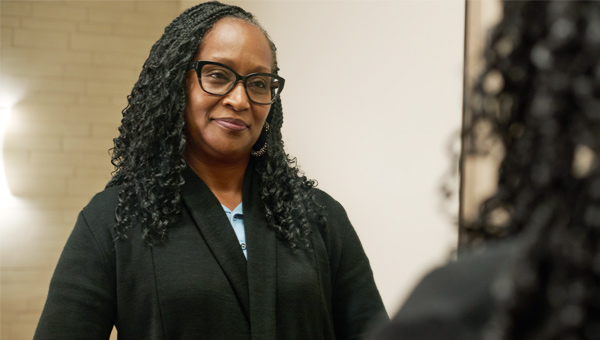 lady preparing for mammogram.