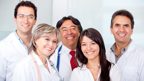 A group of smiling doctors