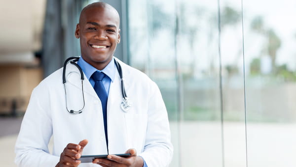 male physician with an ipad