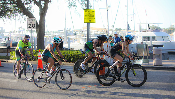 Triathlon athletes riding bikes