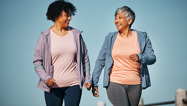 Two ladies walking and talking