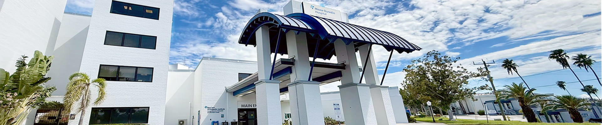 Exterior photo of the main entrance at Mease Dunedin Hospital