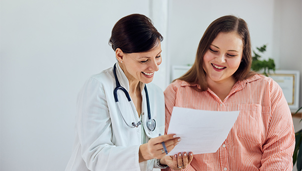 A provider and patient reviewing lab results