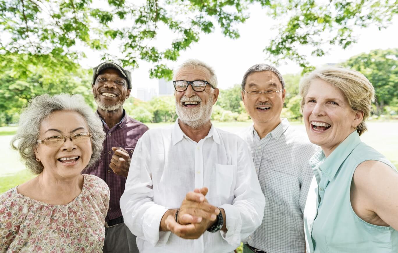 Smiling seniors in a park