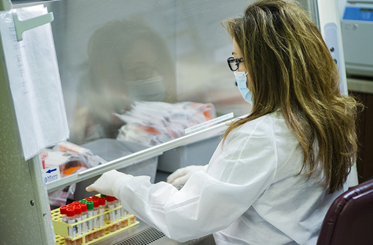 Female medical professional working in a lab