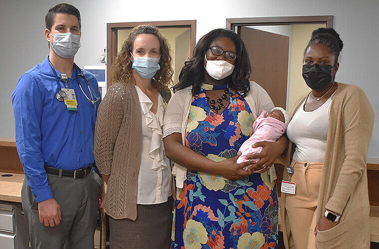 WHWH Patient Beats COVID, Gives Birth and Receives Her Ph.D.