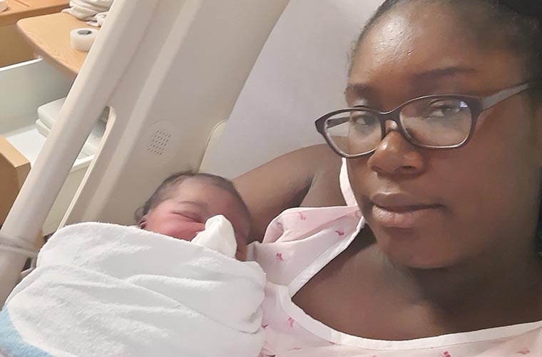 WHWH Patient Beats COVID, Gives Birth and Receives Her Ph.D.