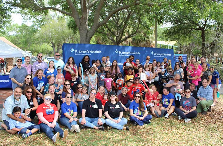 Dozens of St. Joseph's Children's Hospital heart patients reunite with the doctors and nurses who helped repair their hearts during special event