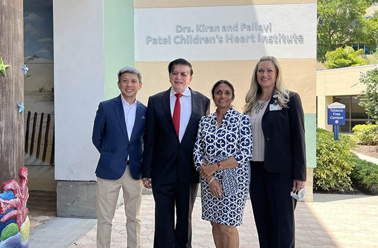 Dr. Karl Reyes and St. Joseph's Children's Hospital President with Drs. Kiran and Pallavi Patel