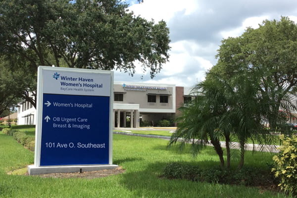 An exterior view of the signage and hospital at BayCare Winter Haven Women's Hospital