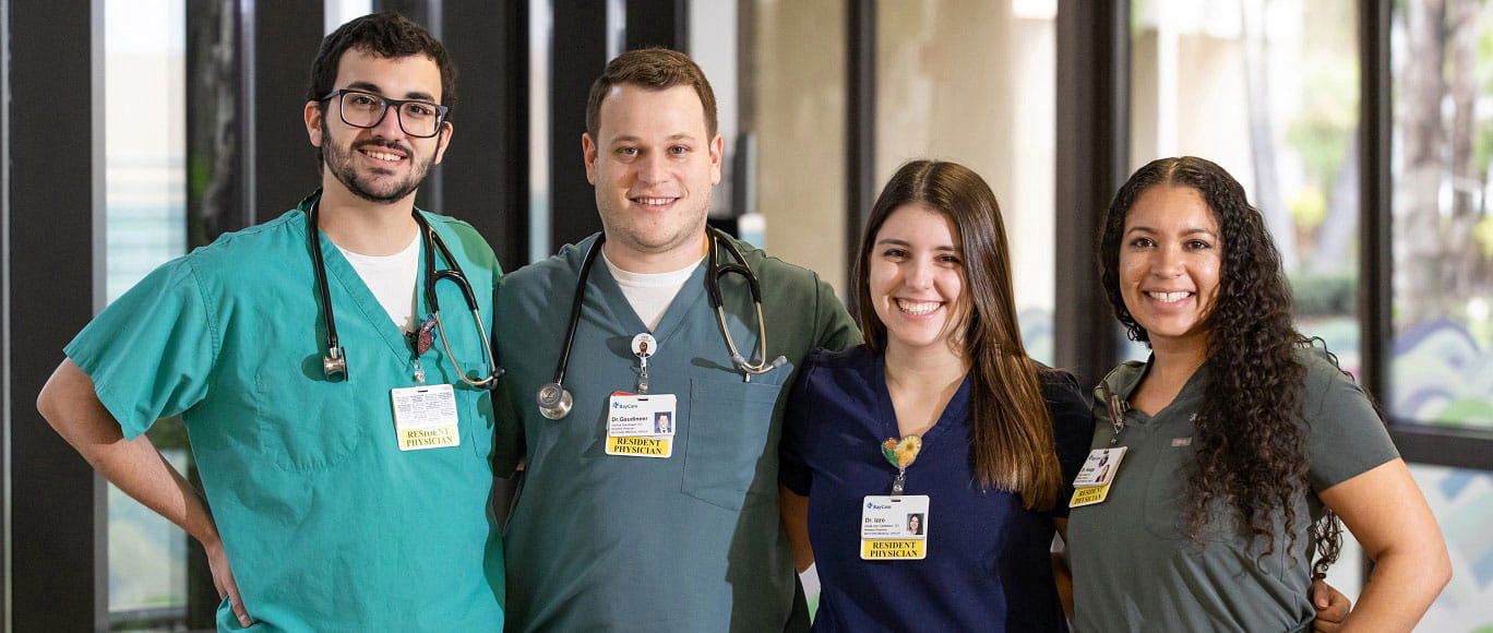 A group of four residents that participate in the BayCare Graduate Medical Education programs.