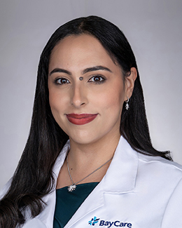 Headshot of Dr. Estefania Roger Barreto in a lab coat 