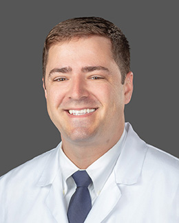 Dr. Jim Shannon's headshot wearing a lab coat 