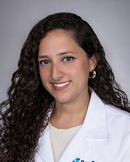 Headshot of Stephanie Izquierdo, MD, MPH in a lab coat