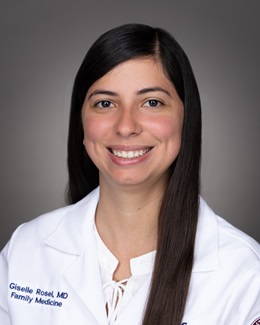 Dr. Giselle Rosel's headshot wearing a lab coat