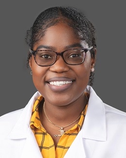 Dr. Barbara Hyacinthe's headshot wearing a lab coat 