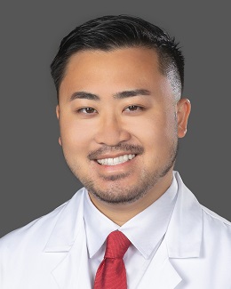 Dr. Alfred Lin's headshot wearing a lab coat 