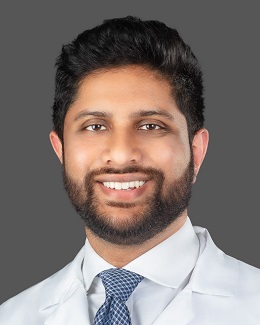 Dr. Sumanth Potluri's headshot wearing a lab coat 