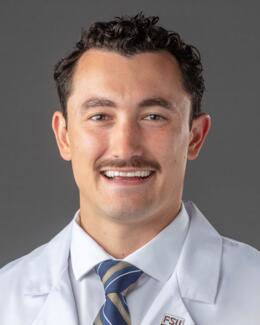 A headshot of Dr. Nicholas Cusmano