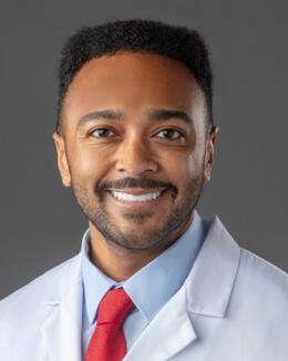 A headshot of Dr. Omar Jean-Baptiste