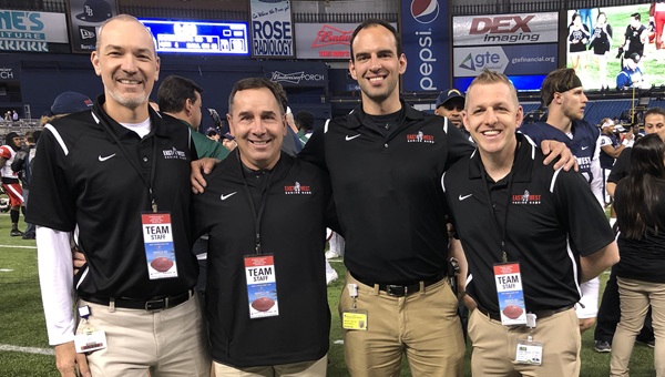 Sports Medicine faculty members providing team coverage at a football game.