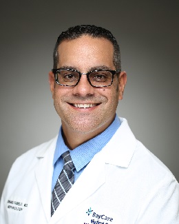 A headshot photo of Edward Fabelo, MD.