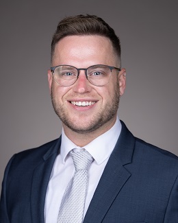 A headshot photo of Trevor Vrona.