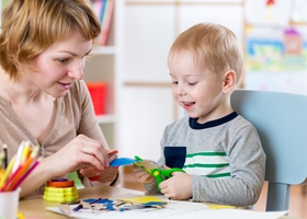 A woman and child playing