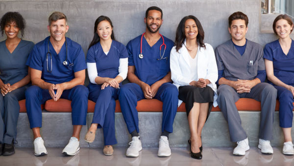 A group of nurses and physicians sitting together