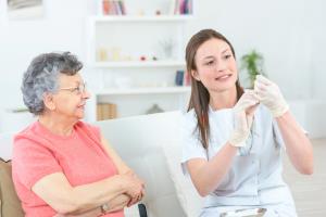 nurse getting a flu shot ready