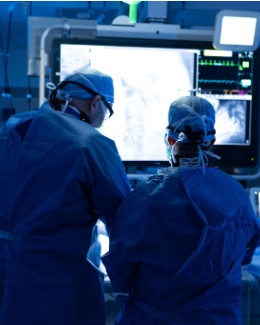 Two physicians in a hybrid operating room