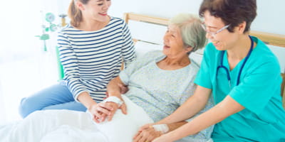Mom and daughter with homecare nurse