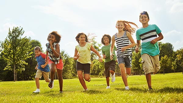 Group of children running.