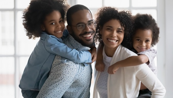 A husband and wife and their two young children