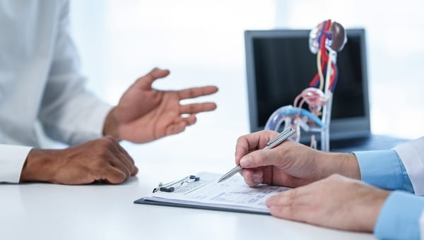 A patient consulting with their physician